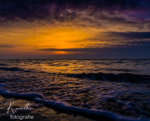 zonsondergang aan het strand