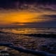 zonsondergang aan het strand