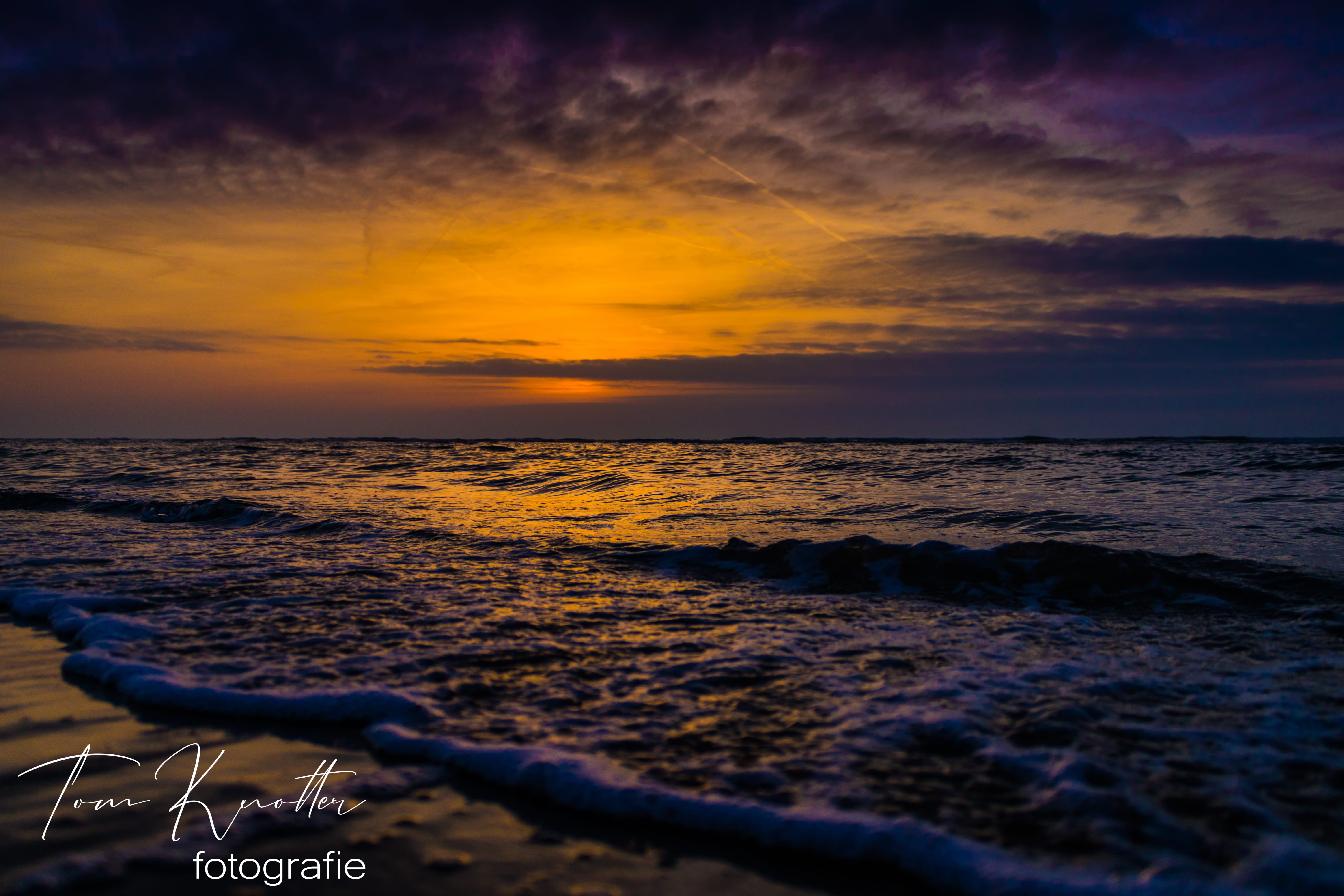 zonsondergang aan het strand